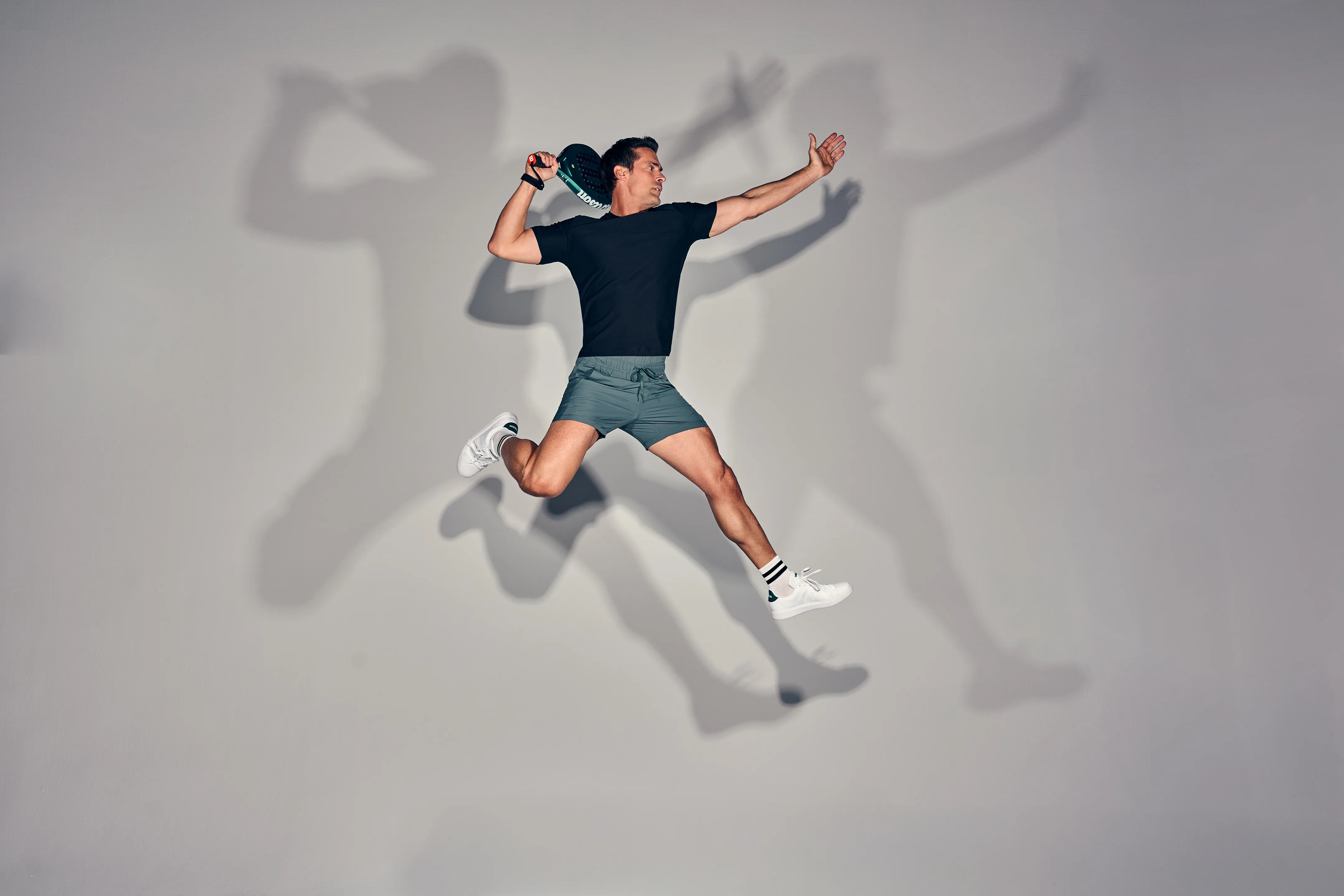 Players on a premium indoor padel court