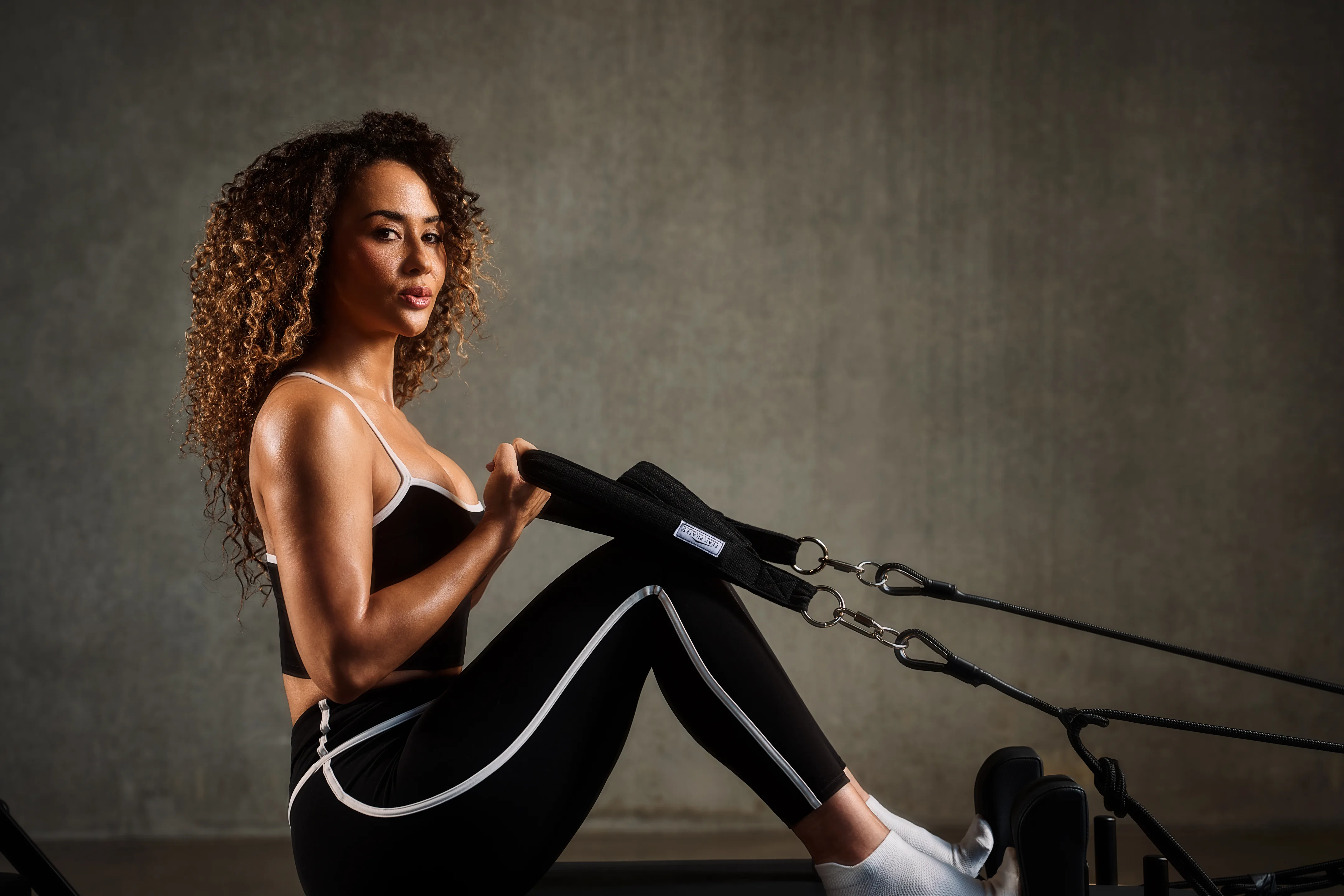 Members training on reformers in a Core Precinct studio